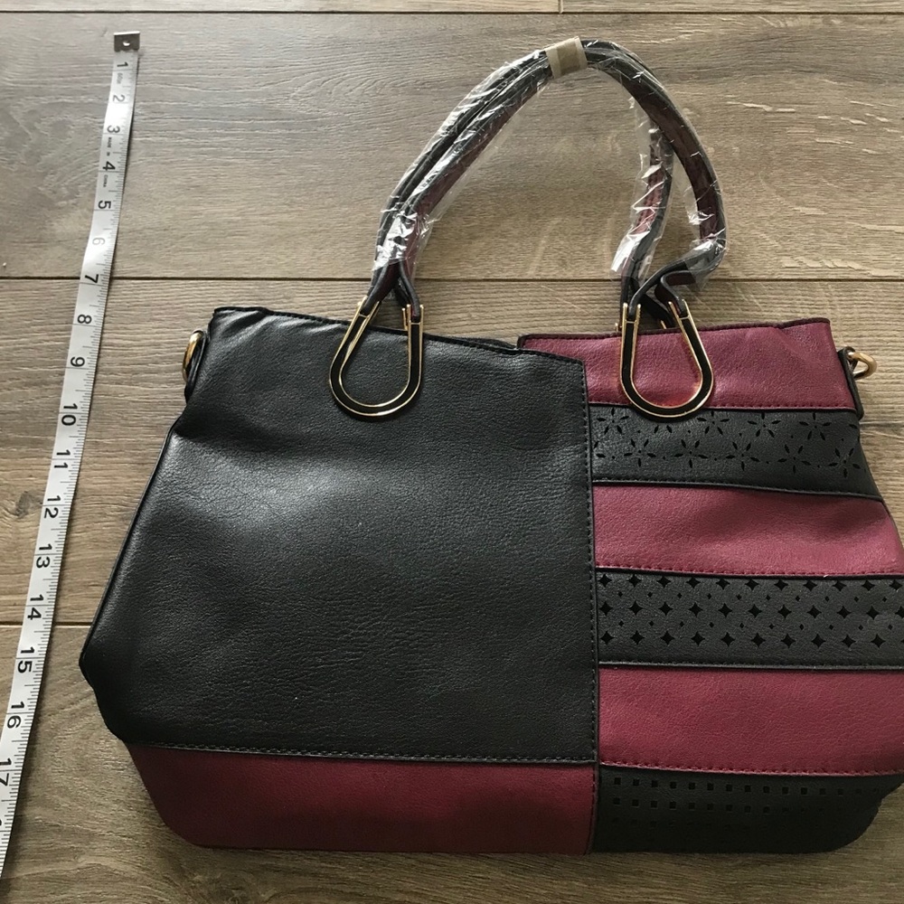 NWOT Serengeti color block black and maroon bag
